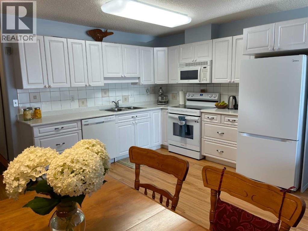 405, 1881 17 Street, Didsbury, Alberta  T0M 0W0 - Photo 6 - A2271728