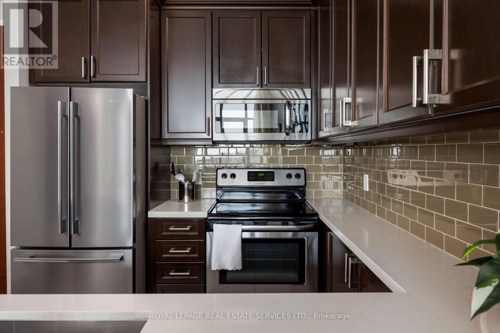 708 - 2470 Prince Michael Drive, Oakville, Ontario  L6H 0G9 - Photo 9 - W12984954