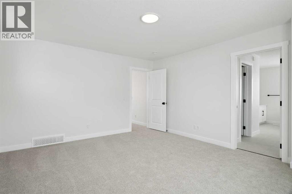 214 Harmony Circle, Rural Rocky View County, Alberta  T3Z 0K9 - Photo 32 - A2291912