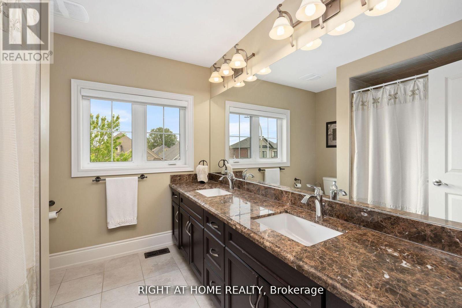 25 Charterhouse Drive N, Whitby, Ontario  L1R 3R8 - Photo 18 - E12973146