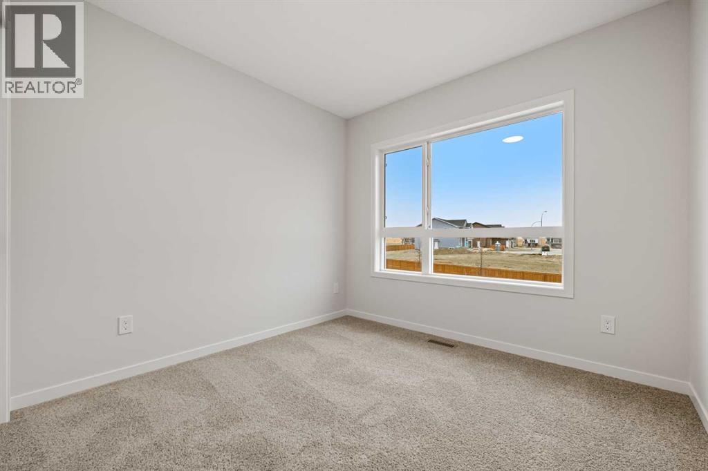 117 Bridgeport Gate, Chestermere, Alberta  T1X 3E5 - Photo 35 - A2285498