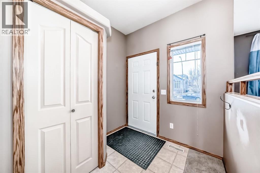 11 Coventry Link NE, Calgary, Alberta  T3K 5H6 - Photo 3 - A2299576