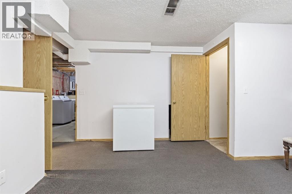 9 Harvest Glen Way NE, Calgary, Alberta  T3K 4J2 - Photo 24 - A2299926