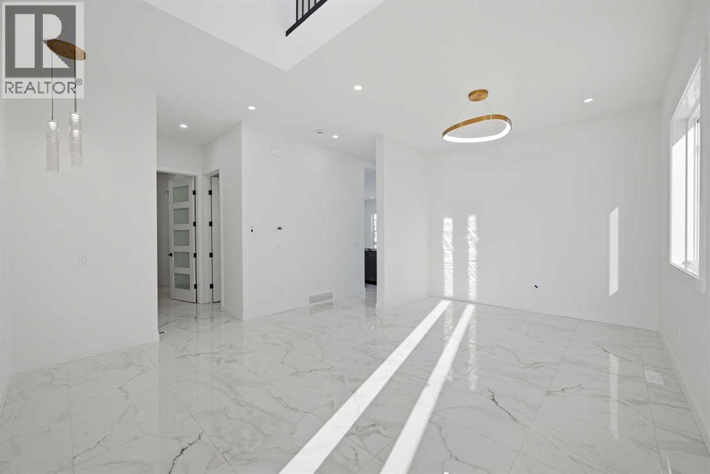 115 Chelsea Channel, Chestermere, Alberta  T1X 2T1 - Photo 6 - A2298972