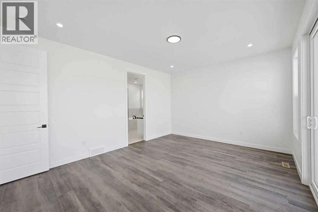 115 Chelsea Channel, Chestermere, Alberta  T1X 2T1 - Photo 26 - A2298972