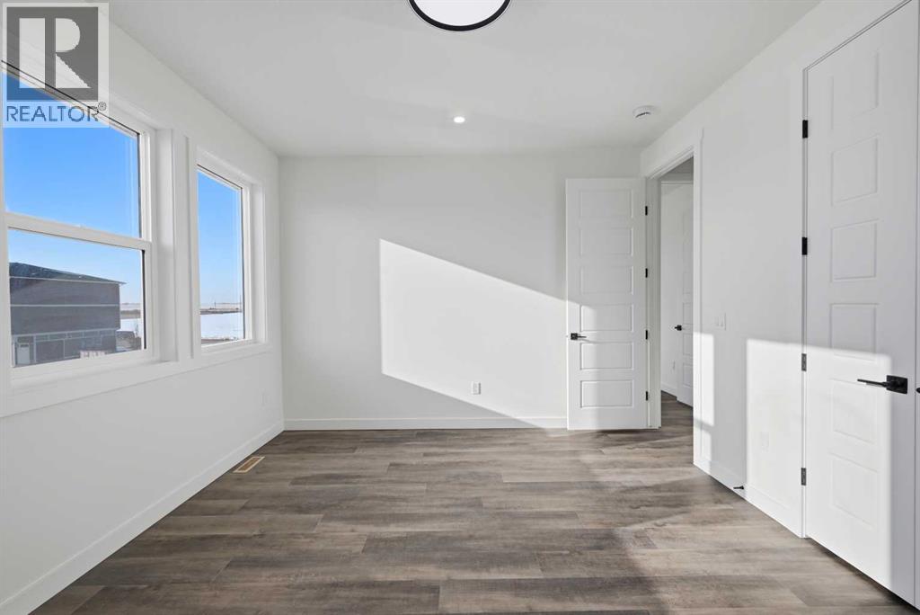 115 Chelsea Channel, Chestermere, Alberta  T1X 2T1 - Photo 40 - A2298972