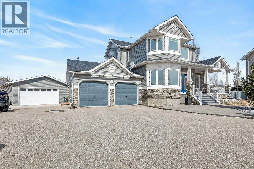 7 Henderson Bay NE, Langdon, Alberta  T0J 1X1 - Photo 1 - A2300665