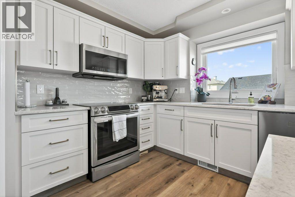 7 Henderson Bay NE, Langdon, Alberta  T0J 1X1 - Photo 3 - A2300665