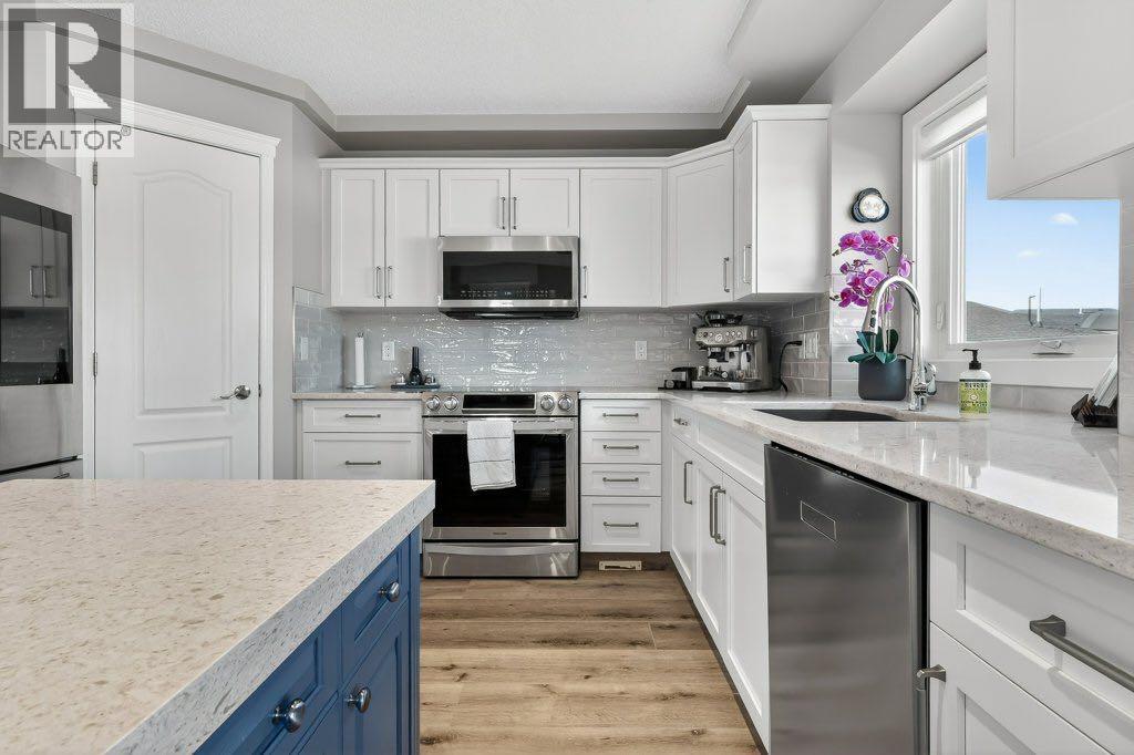 7 Henderson Bay NE, Langdon, Alberta  T0J 1X1 - Photo 5 - A2300665