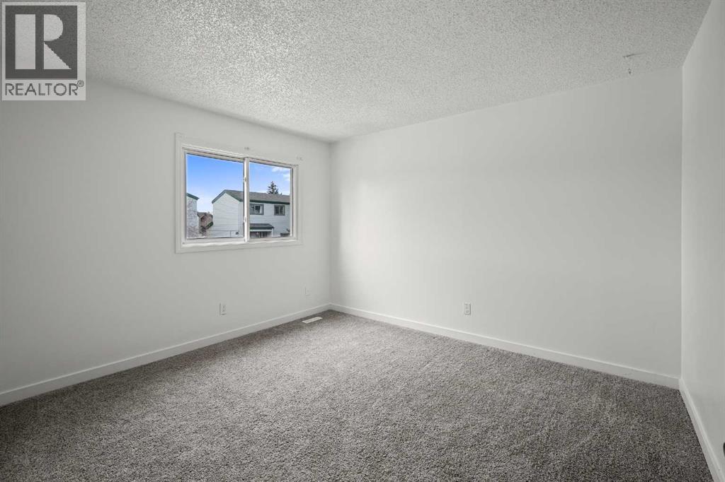16, 131 Templehill Drive Ne, Calgary, Alberta T1Y 4T1 - Photo 27 - A2288851