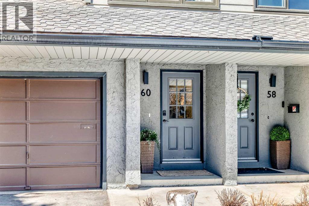 60 Point Drive NW, Calgary, Alberta  T3B 5B3 - Photo 2 - A2300197