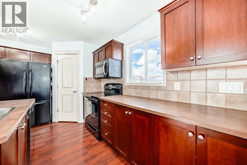 336 Luxstone Place SW, Airdrie, Alberta  T4B 0A6 - Photo 6 - A2300038