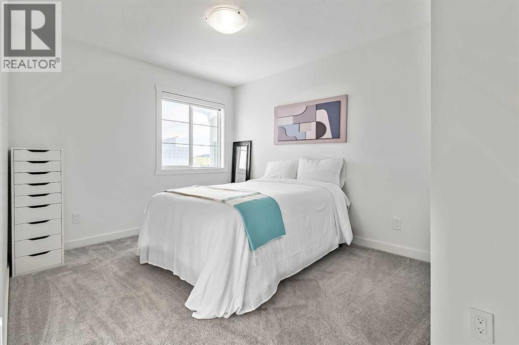 882 Bluerock Way Sw, Calgary, Alberta T2Y 0S5 - Photo 29 - A2293006