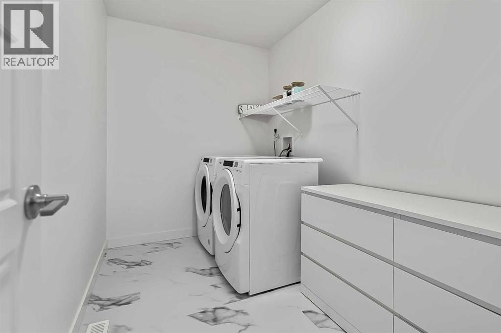 882 Bluerock Way Sw, Calgary, Alberta T2Y 0S5 - Photo 31 - A2293006