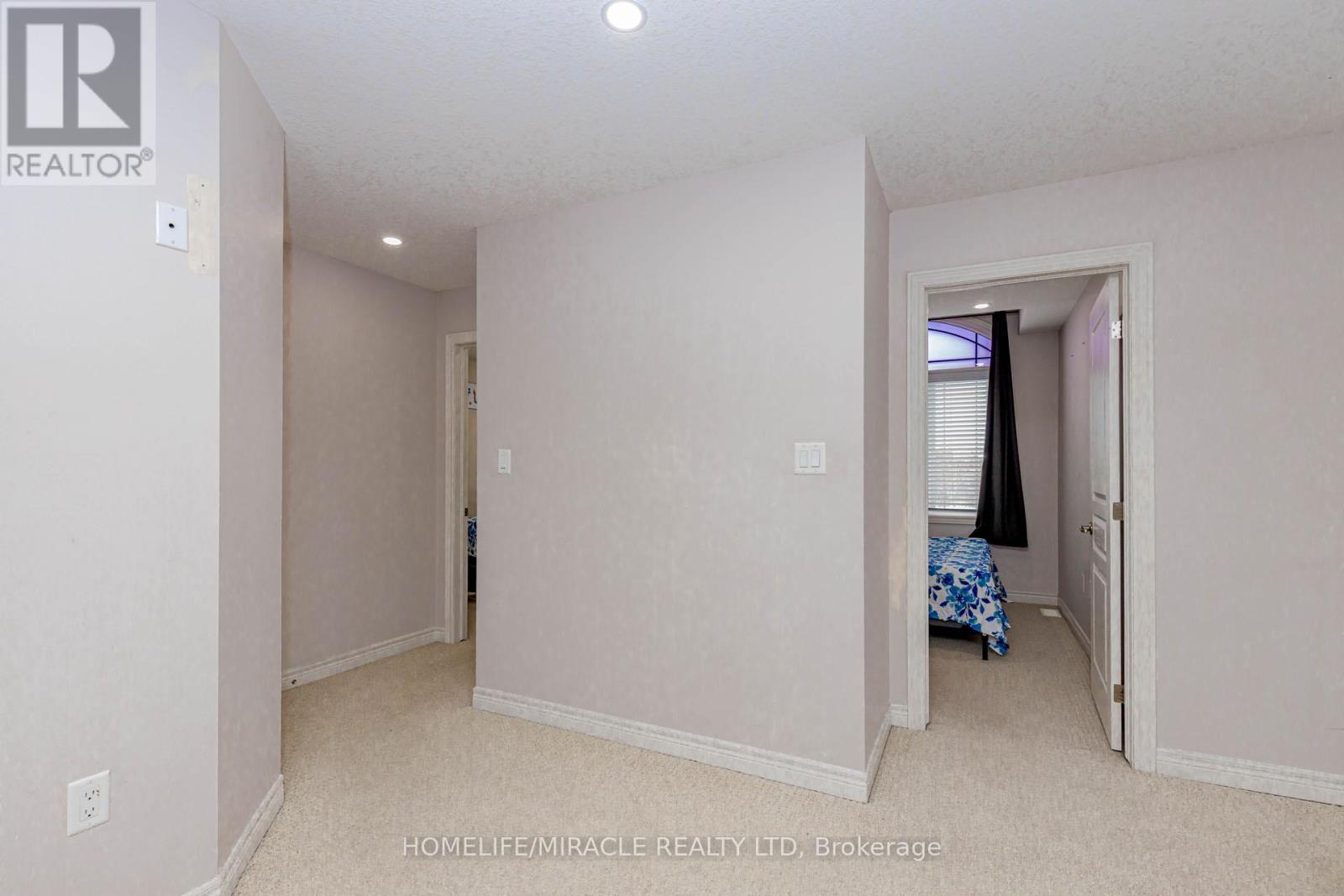 2 Doon Creek Street, Kitchener, Ontario  N2P 2R3 - Photo 32 - X12986128