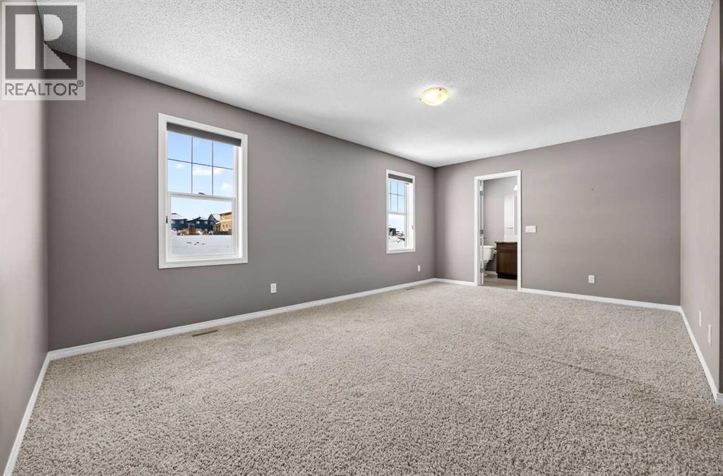 35 Windcreek Terrace SW, Airdrie, Alberta  T4B 0Y4 - Photo 30 - A2296238