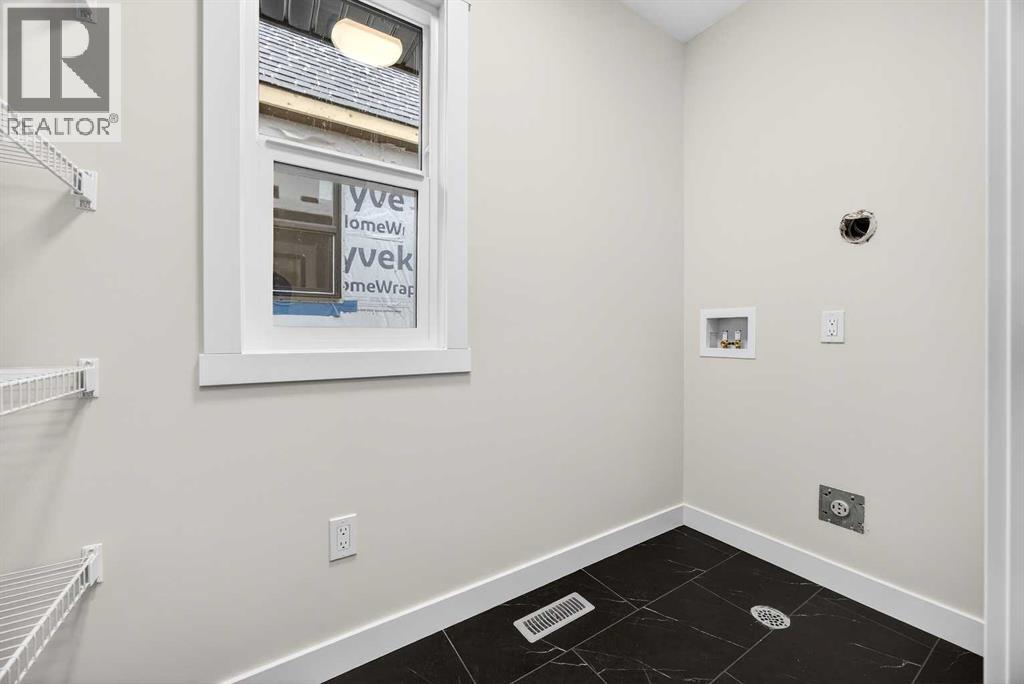 306 Alpine Boulevard, Calgary, Alberta  T2Y 0Y4 - Photo 38 - A2270684