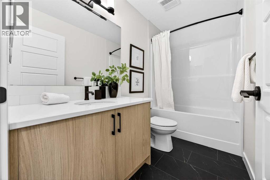 306 Alpine Boulevard, Calgary, Alberta  T2Y 0Y4 - Photo 35 - A2270684