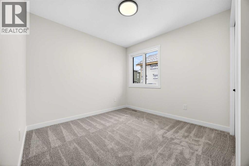 306 Alpine Boulevard, Calgary, Alberta  T2Y 0Y4 - Photo 36 - A2270684