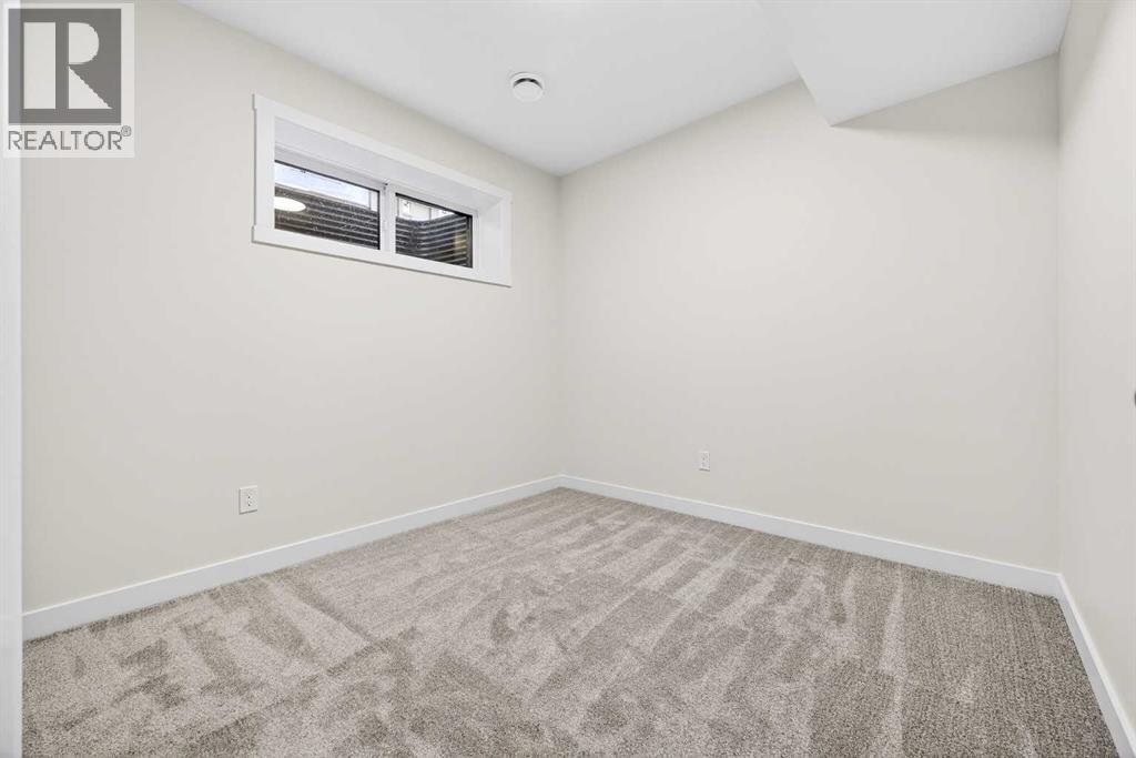 306 Alpine Boulevard, Calgary, Alberta  T2Y 0Y4 - Photo 43 - A2270684