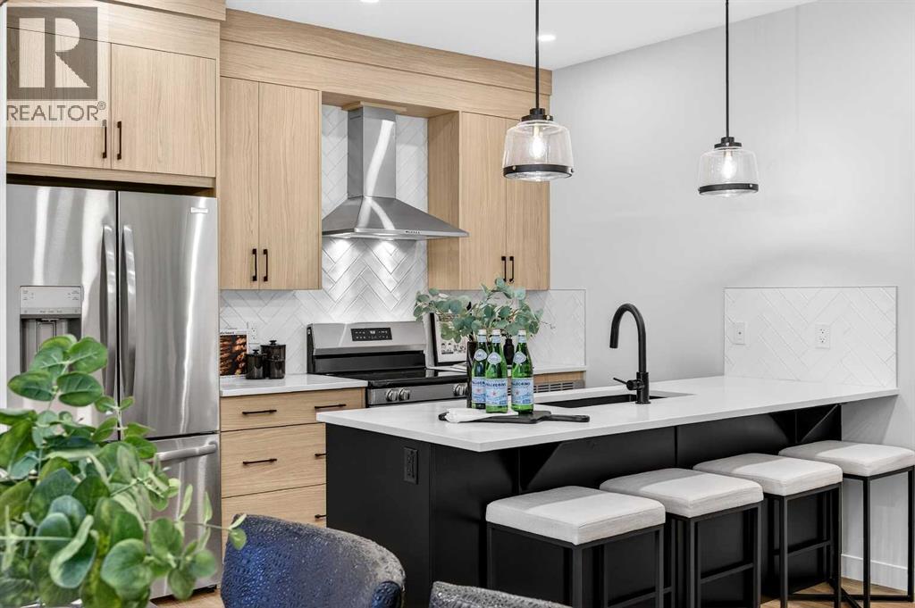 306 Alpine Boulevard, Calgary, Alberta  T2Y 0Y4 - Photo 11 - A2270684