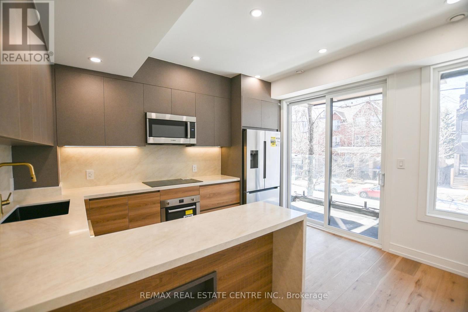 57 Jones Avenue, Toronto, Ontario  M4M 2Z7 - Photo 9 - E12986364