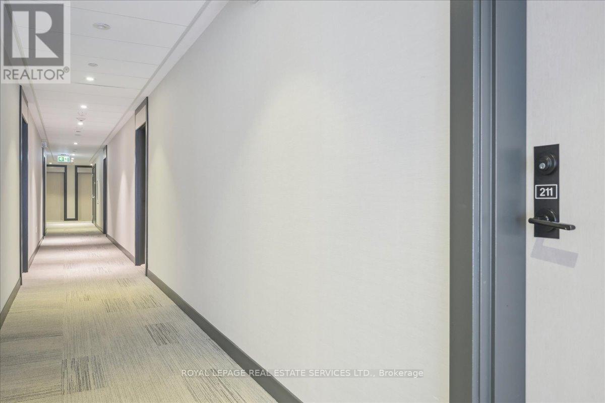 211 - 168 Sabina Drive, Oakville, Ontario  L6H 0W5 - Photo 5 - W12986366