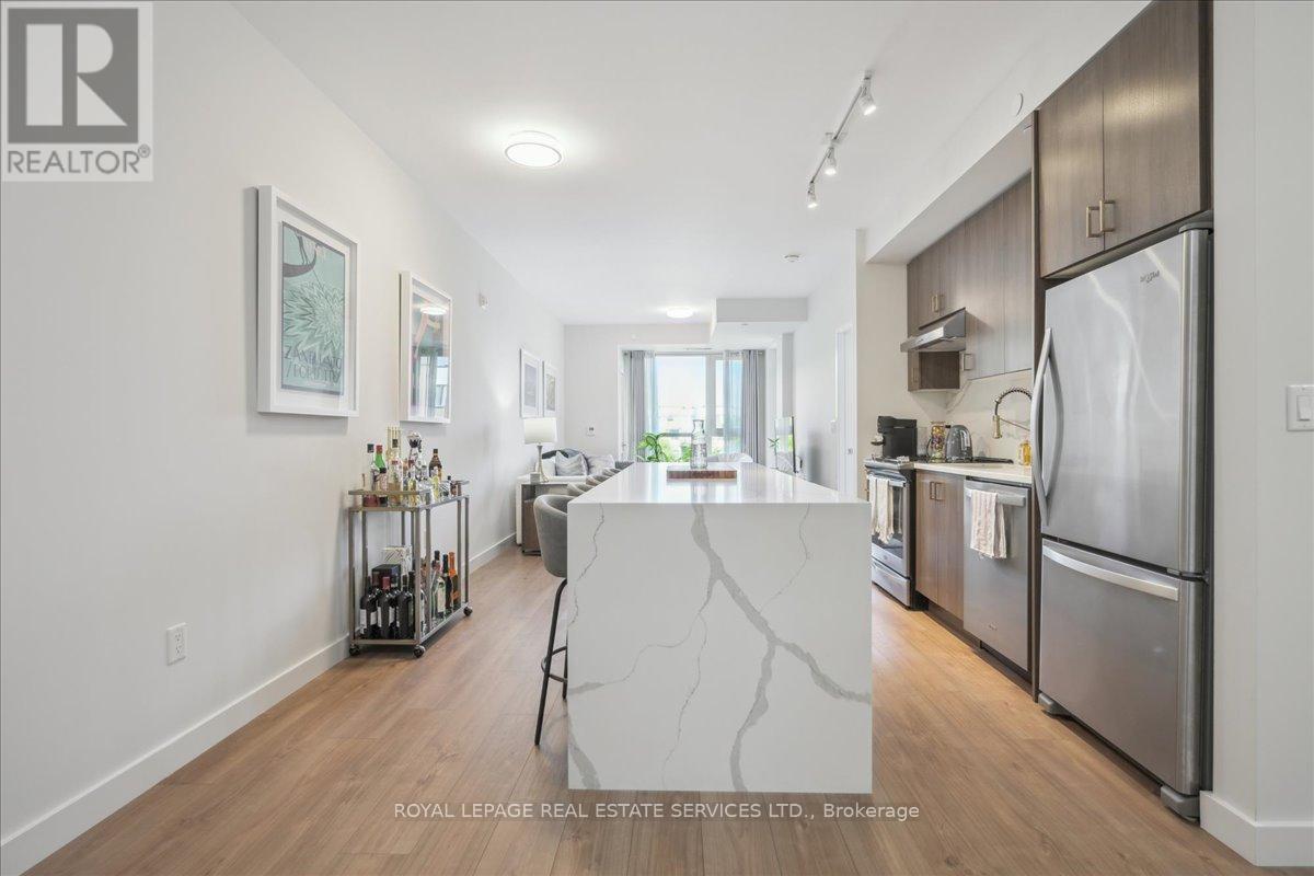 211 - 168 Sabina Drive, Oakville, Ontario  L6H 0W5 - Photo 7 - W12986366