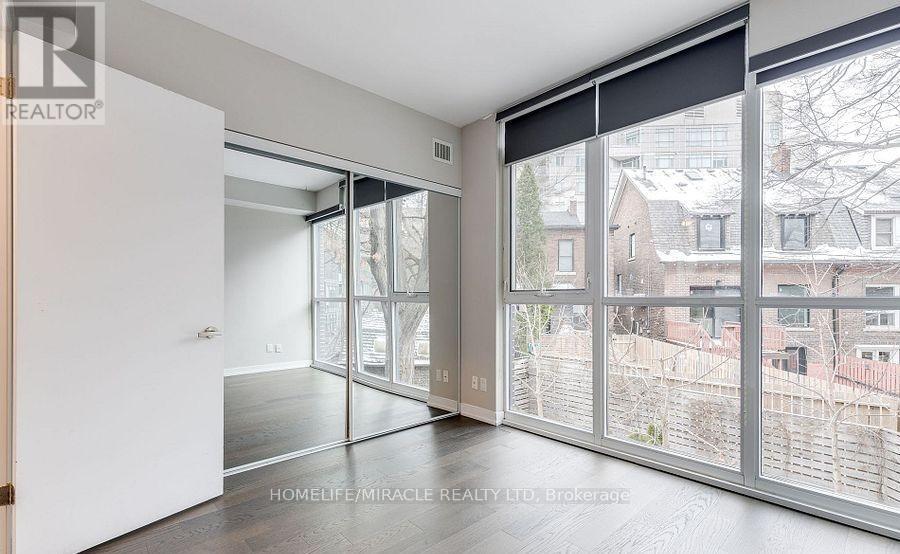 Th155 - 38 Howard Park Avenue, Toronto, Ontario  M6R 0A7 - Photo 4 - W12986486