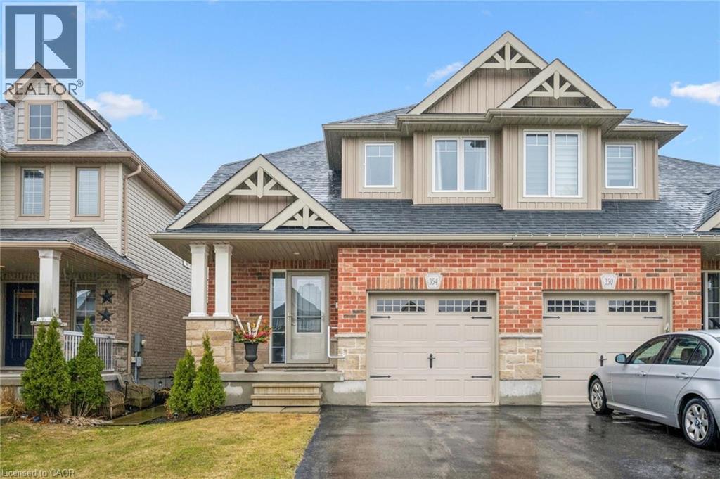 Discover this exceptional semi-detached home that effortlessly combines timeless charm with modern practicality. The upper level boasts a spacious primary bedroom, a loft area bedroom, and a luxurious 4-piece bathroom complete with heated flooring. The convenience of laundry facilities located on the second floor enhances the ease of daily living. On the main floor you'll find an open-concept layout, a modern kitchen equipped with a large island, a generously sized living room accentuated by a vaulted ceiling, and a convenient sliding door that opens up to the backyard. A welcoming dinette area offers a perfect setting for entertaining guests, while a well-appointed 3-piece bathroom adds to the functionality of the main floor. Additionally, the living room includes a closet that presents the opportunity for potential conversion into a main floor bedroom, catering to those seeking single-story living. Step outside to your thoughtfully landscaped backyard, with a gorgeous meticulously designed deck. A single-car garage with inside access further elevates the convenience and utility of this exceptional home. The unfinished basement offers 790sq ft of potential living space with large windows and a bathroom rough-in, it awaits your personal touch for added bedrooms, a recreation room, or home gym. Ideally located near schools, Elmira Golf Club, Woolwich Memorial Centre, the downtown, and parks. This home is a rare find combining style, comfort, and flexibility. **OFFERS ANYTIME** (id:48254)