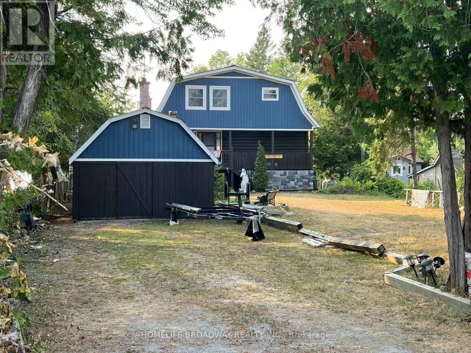 1389 Portage Road, Kawartha Lakes, Ontario  K0M 2B0 - Photo 2 - X12986296