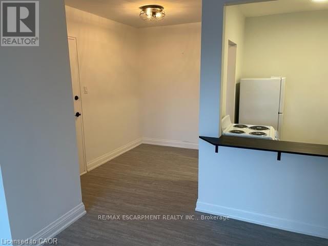 211 - 37 Mericourt Road, Hamilton (Ainslie Wood), Ontario  L8S 2N5 - Photo 3 - X12986756