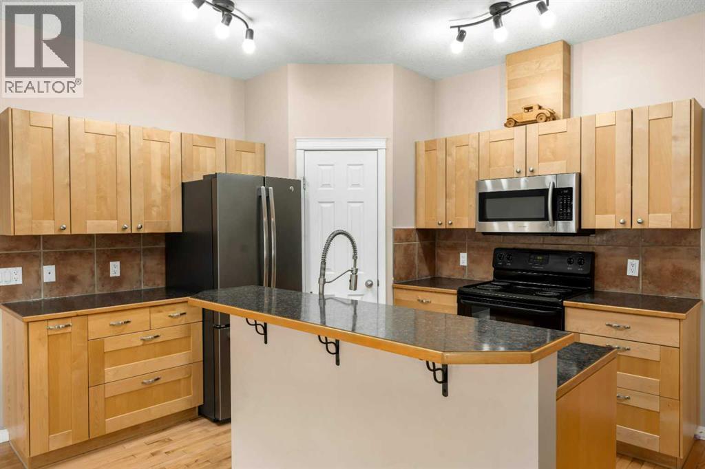 748 Carriage Lane Drive, Carstairs, Alberta  T0M 0N0 - Photo 7 - A2300925