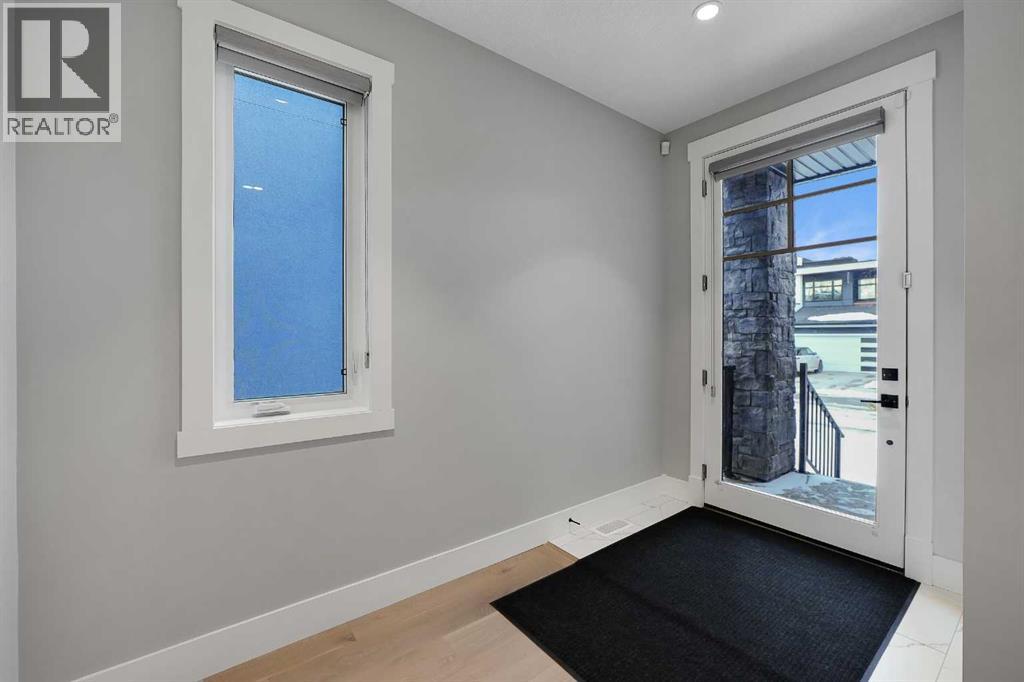 106 Rock Lake Heights Nw, Calgary, Alberta  T3G 0G3 - Photo 2 - A2298601