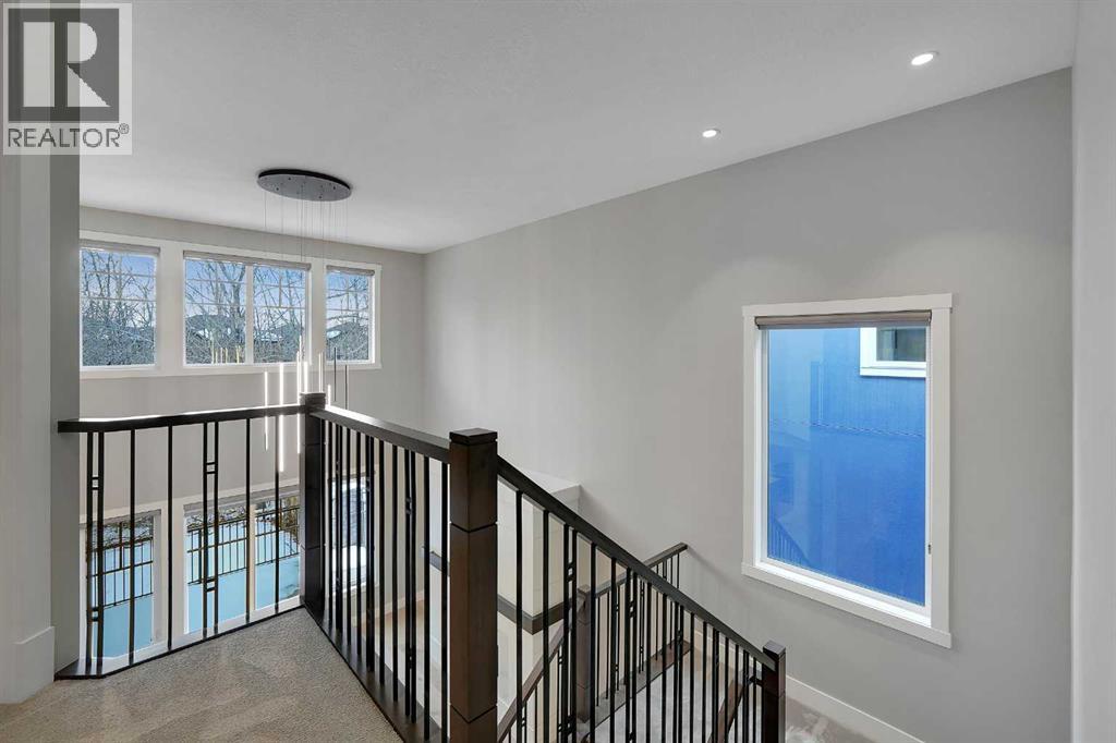 106 Rock Lake Heights Nw, Calgary, Alberta  T3G 0G3 - Photo 12 - A2298601