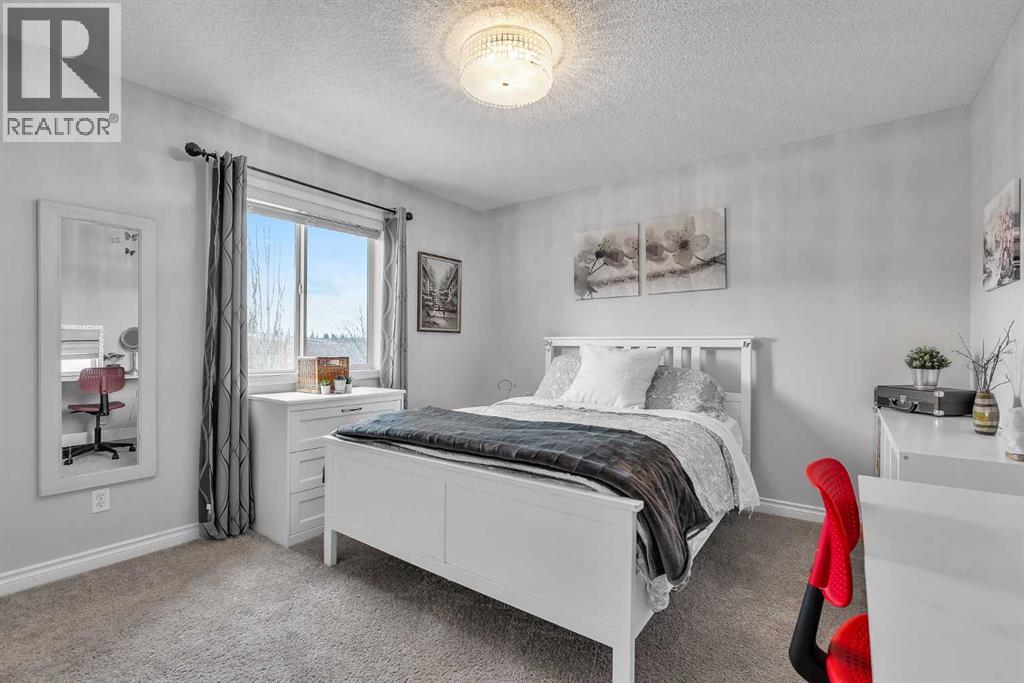 92 Bow Ridge Crescent, Cochrane, Alberta  T4C 1V1 - Photo 36 - A2299917