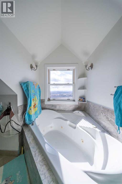 39 Slopes Grove Sw, Calgary, Alberta  T3H 3Y6 - Photo 16 - A2299187