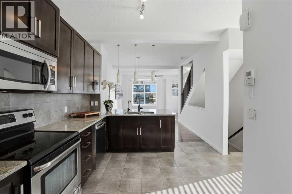 205 New Brighton Row Se, Calgary, Alberta  T2Z 1B9 - Photo 9 - A2294327
