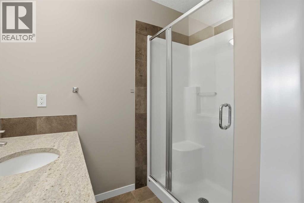 205 New Brighton Row Se, Calgary, Alberta  T2Z 1B9 - Photo 27 - A2294327