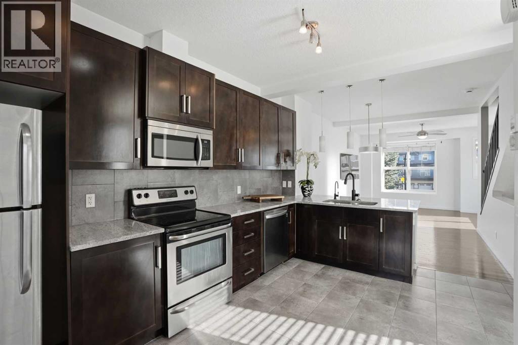 205 New Brighton Row Se, Calgary, Alberta  T2Z 1B9 - Photo 5 - A2294327