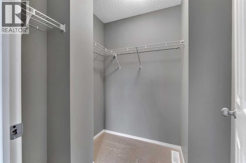 68 Panatella Villas Nw, Calgary, Alberta  T3K 0G6 - Photo 17 - A2286938