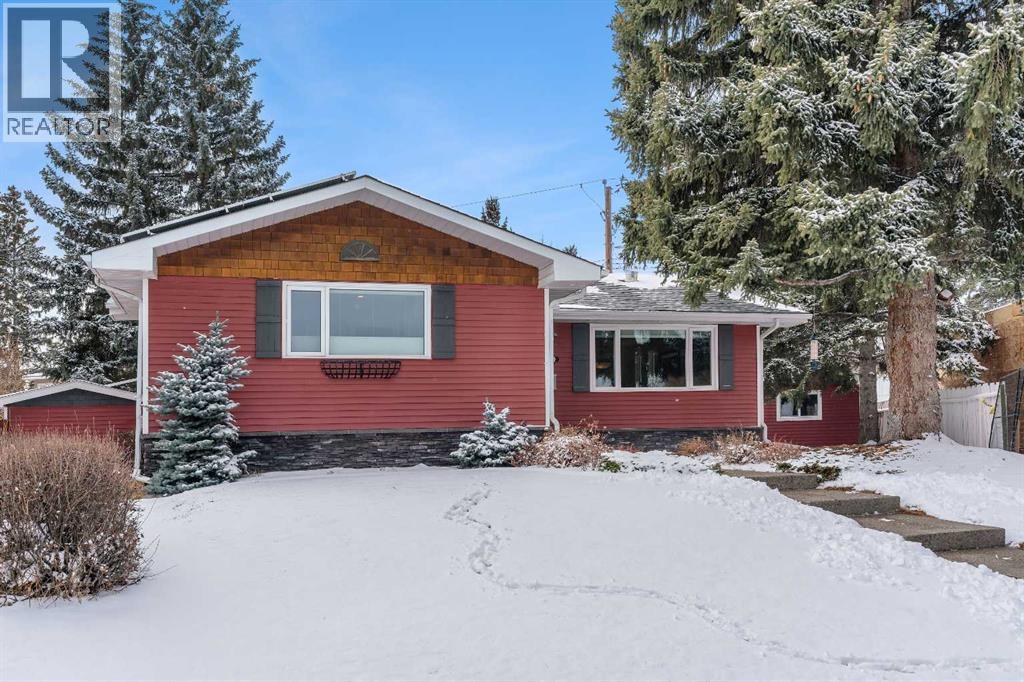 5411 Ladbrooke Drive SW, Calgary, Alberta  T3E 5X9 - Photo 4 - A2291483