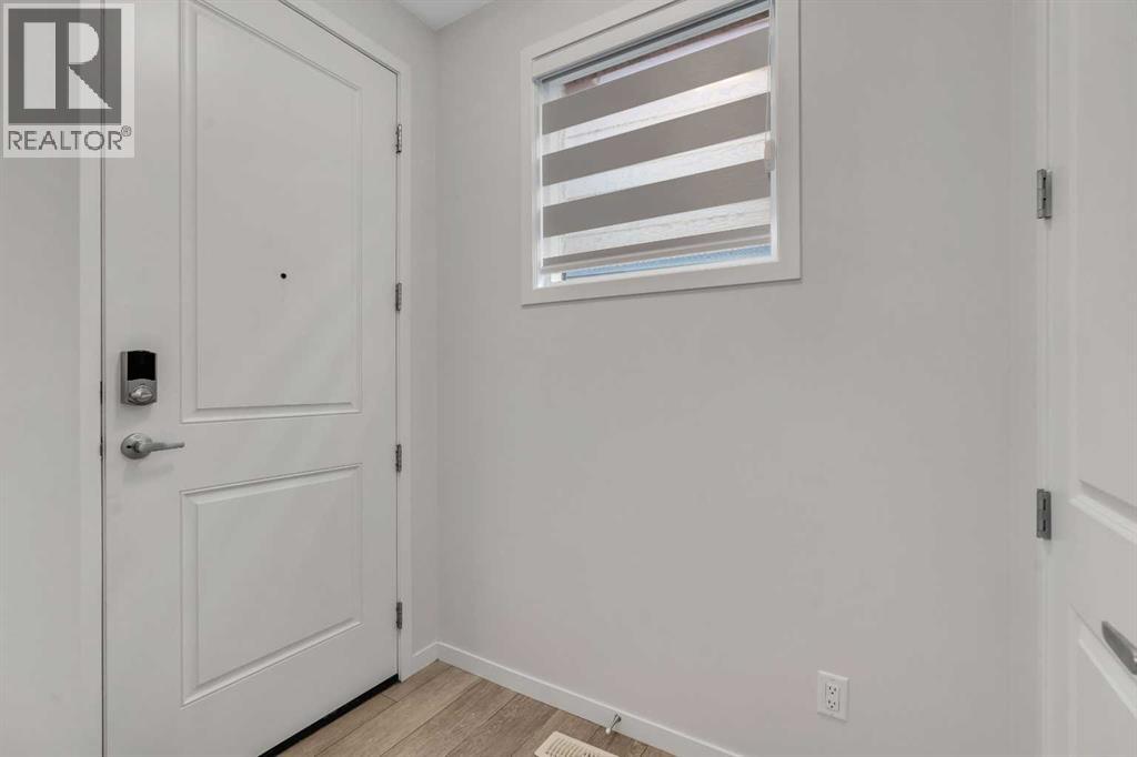 20 Rowley Common Nw, Calgary, Alberta  T3L 0H8 - Photo 5 - A2295925