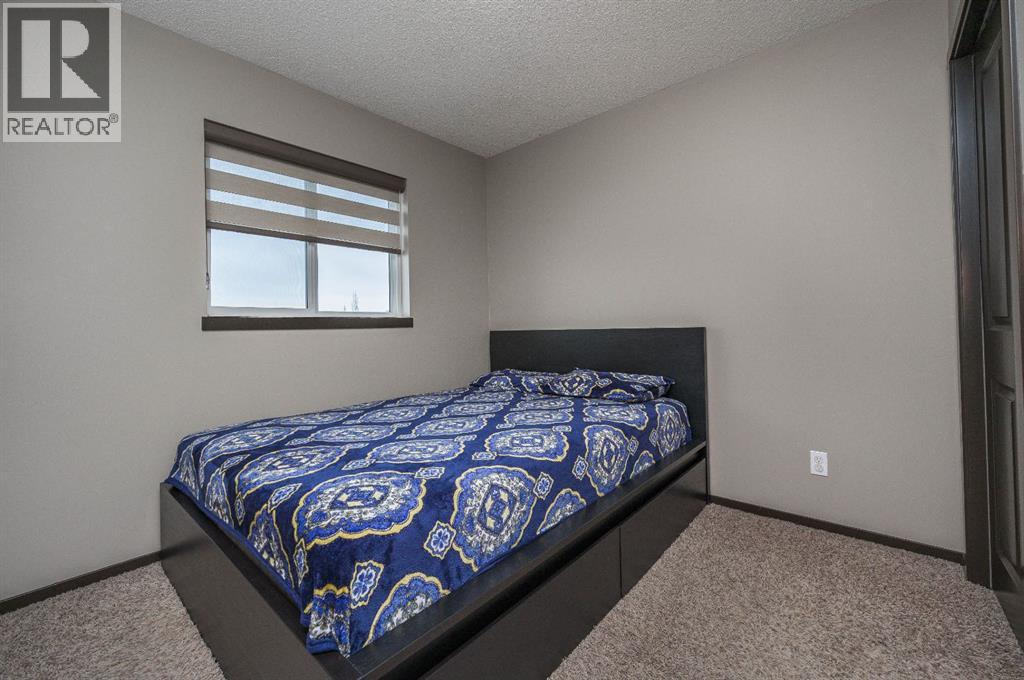 702 Panamount Boulevard NW, Calgary, Alberta  T3K 0P7 - Photo 19 - A2299325