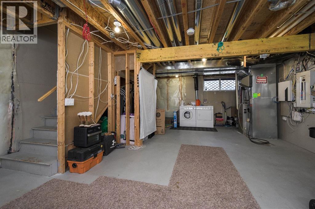 702 Panamount Boulevard NW, Calgary, Alberta  T3K 0P7 - Photo 27 - A2299325