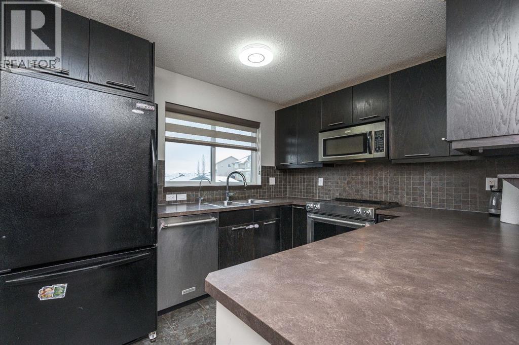 702 Panamount Boulevard NW, Calgary, Alberta  T3K 0P7 - Photo 11 - A2299325