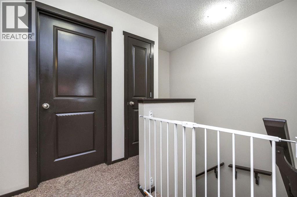 702 Panamount Boulevard NW, Calgary, Alberta  T3K 0P7 - Photo 16 - A2299325