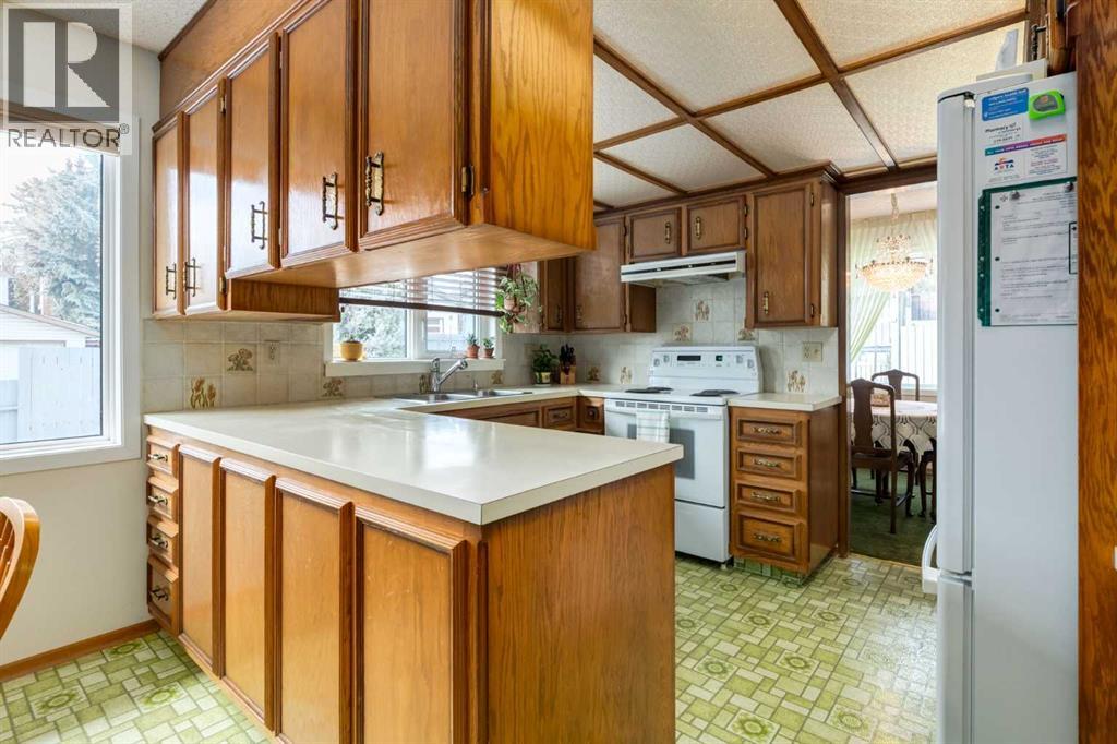 68 Silver Ridge Court NW, Calgary, Alberta  T3B 4V5 - Photo 10 - A2299788