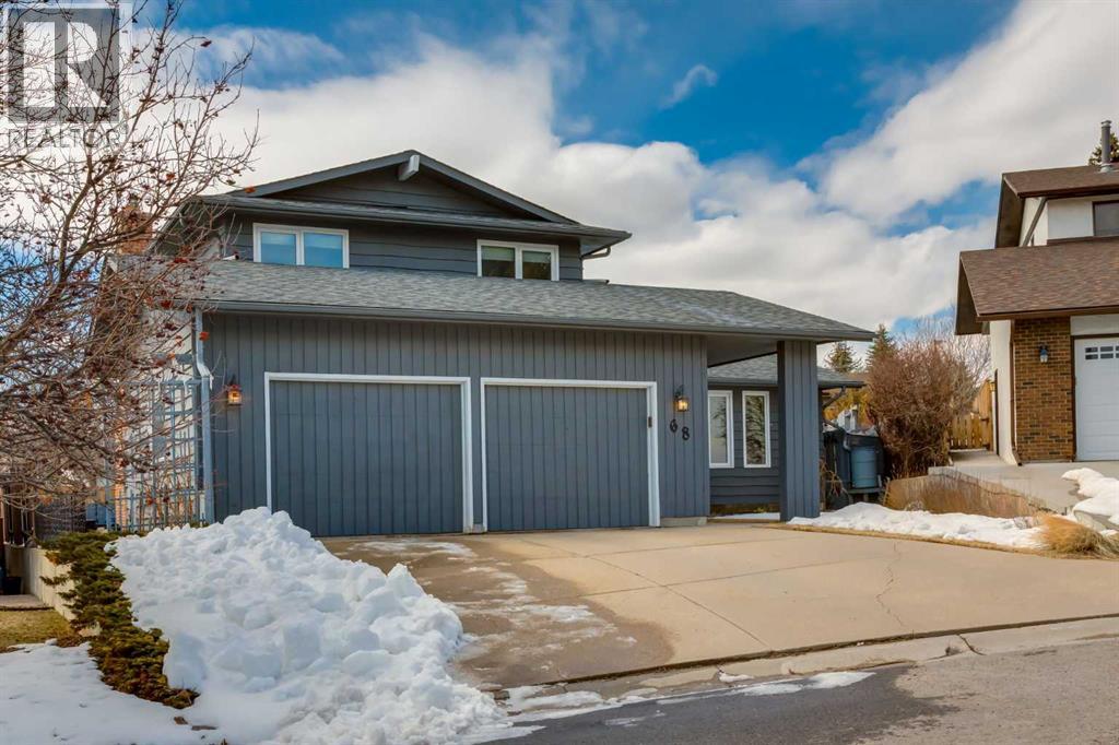 68 Silver Ridge Court NW, Calgary, Alberta  T3B 4V5 - Photo 2 - A2299788