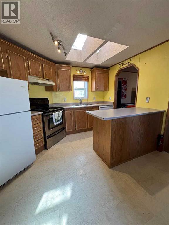 37, 6220 17 Avenue Se, Calgary, Alberta  T2A 0w6 - Photo 2 - A2299159